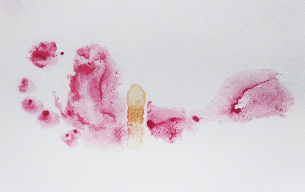 a red footprint with a band aid in watercolor