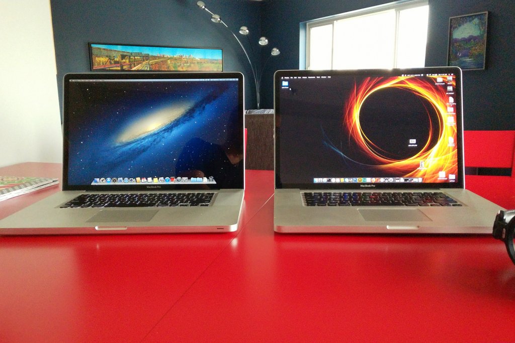 An image of 2 identical Macbook laptops